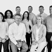 Ledge Wealth Management. Seated - Kurt Durrwachter, Gina Bartell. Standing from left to right - Robin Schaa, Sandra Middendorf, Seth Jungels, Chelsea Bentley, Kevin J. Kluesner, Sam Ronlund, Marshall Grams